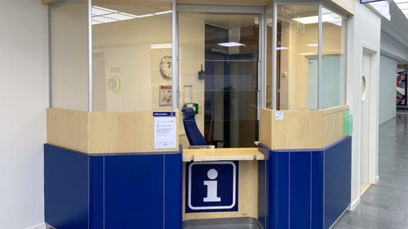 Blå informationsdisk.