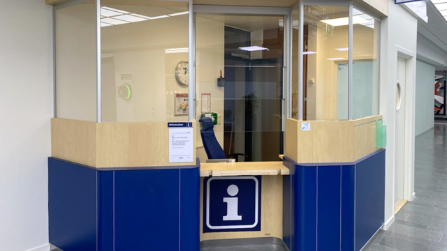 Blå informationsdisk.